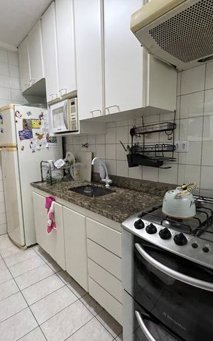 Apartamento à venda com 58m², 2 quartos e 1 vaga Apartamento à venda com 58m², 2 quartos e 1 vagaCozinha e Área de Serviço