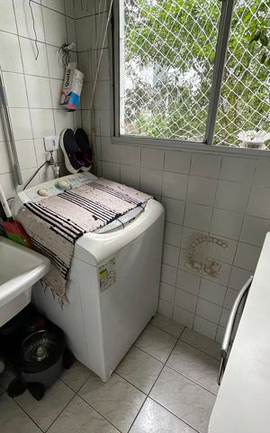 Apartamento à venda com 58m², 2 quartos e 1 vaga Apartamento à venda com 58m², 2 quartos e 1 vagaCozinha e Área de Serviço