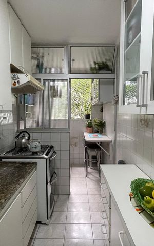 Apartamento à venda com 58m², 2 quartos e 1 vaga Apartamento à venda com 58m², 2 quartos e 1 vagaCozinha e Área de Serviço