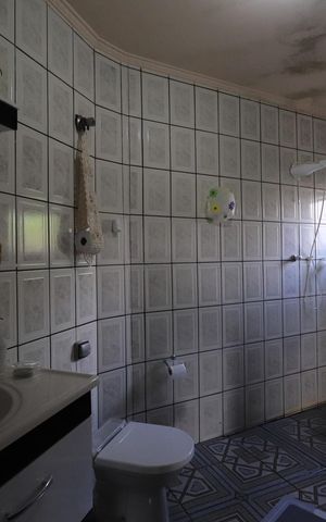 Casa à venda com 261m², 5 quartos e 3 vagasBanheiro 2 Casa 2