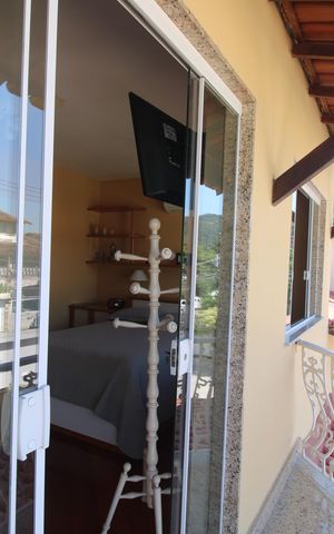 Casa de condomínio à venda com 360m², 3 quartos e 3 vagasSuíte - Varanda