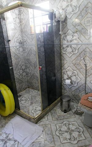 Casa de condomínio à venda com 235m², 4 quartos e 3 vagasBanheiro da Suíte 1