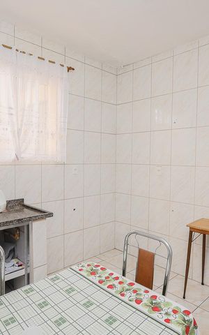 Casa à venda com 70m², 3 quartos e 2 vagas Casa à venda com 70m², 3 quartos e 2 vagasCozinha