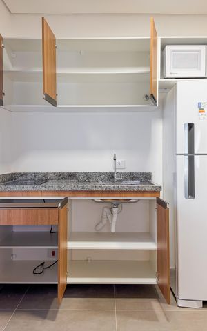 Studio para alugar com 34m², 1 quarto e sem vaga Studio para alugar com 34m², 1 quarto e sem vagaCozinha - Armários
