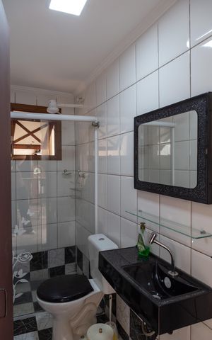 Casa à venda com 375m², 3 quartos e 4 vagasBanheiro da Área gourmet