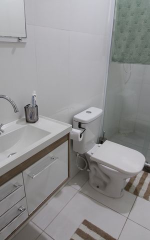 Casa de condomínio à venda com 125m², 3 quartos e 1 vagaBanheiro Social 2