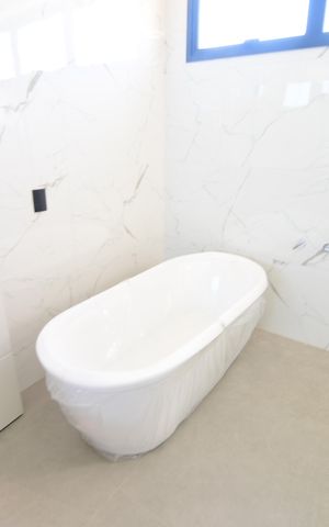 Casa de condomínio à venda com 340m², 5 quartos e 4 vagasBanheiro Suíte
