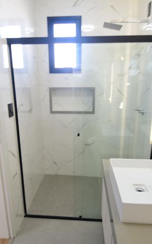 Casa de condomínio à venda com 340m², 5 quartos e 4 vagasBanheiro Suíte