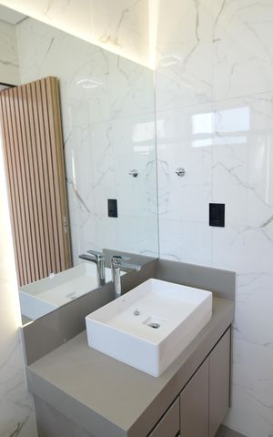 Casa de condomínio à venda com 340m², 5 quartos e 4 vagasBanheiro Suíte