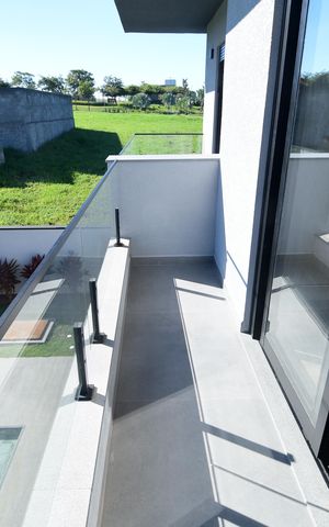 Casa de condomínio à venda com 340m², 5 quartos e 4 vagasQuarto 2 - Suíte Sacada