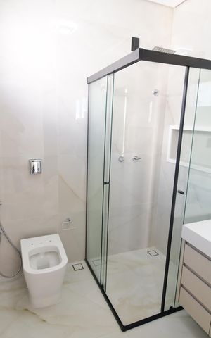 Casa de condomínio à venda com 340m², 5 quartos e 4 vagasBanheiro Suíte