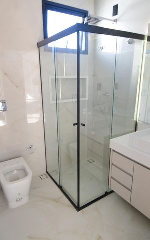 Casa de condomínio à venda com 340m², 5 quartos e 4 vagasBanheiro Suíte
