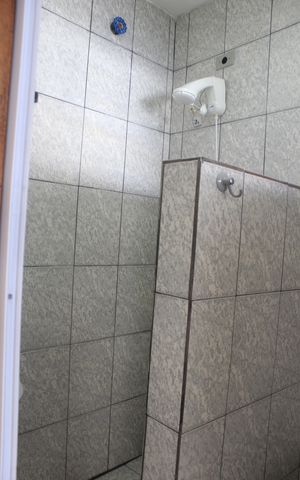 Casa à venda com 243m², 2 quartos e 2 vagasBanheiro da lavanderia 
