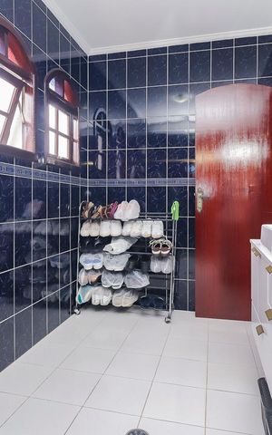 Casa à venda com 320m², 3 quartos e 5 vagasBanheiro da Suíte 1