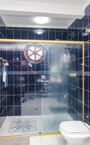 Casa à venda com 320m², 3 quartos e 5 vagasBanheiro da Suíte 1
