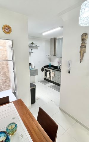 Casa de condomínio à venda com 102m², 2 quartos e 2 vagasSala/Cozinha