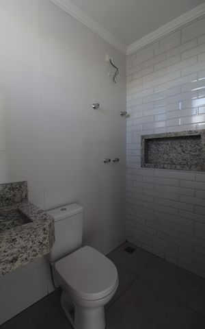 Casa à venda com 163m², 3 quartos e 2 vagasBanheiro da Suite