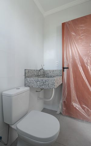 Casa à venda com 118m², 3 quartos e 1 vagaBanheiro da Suite