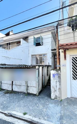 Casa à venda com 105m², 3 quartos e 1 vaga Casa à venda com 105m², 3 quartos e 1 vagaFachada/Placa