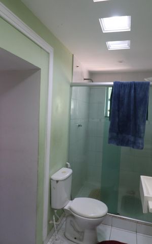 Casa de condomínio à venda com 90m², 3 quartos e 2 vagasBanheiro da Suíte