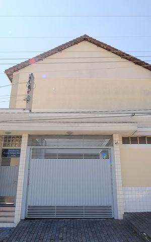 Casa de condomínio à venda com 119m², 2 quartos e 2 vagasFachada