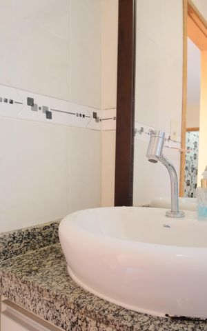Casa de condomínio à venda com 119m², 2 quartos e 2 vagasBanheiro da Suíte 1