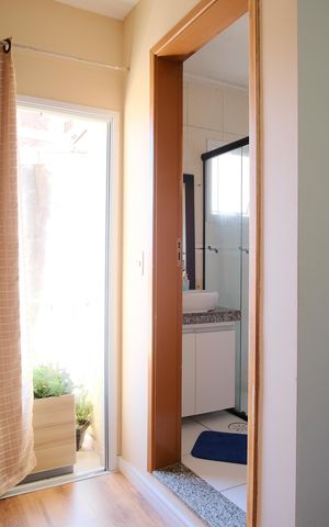 Casa de condomínio à venda com 119m², 2 quartos e 2 vagasSuíte 1