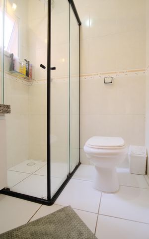 Casa de condomínio à venda com 119m², 2 quartos e 2 vagasBanheiro da Suíte 2
