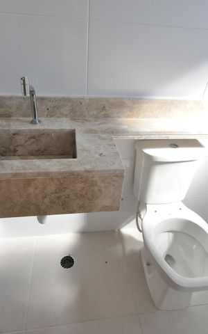 Casa à venda com 100m², 3 quartos e 1 vagaBanheiro do Quarto Suíte
