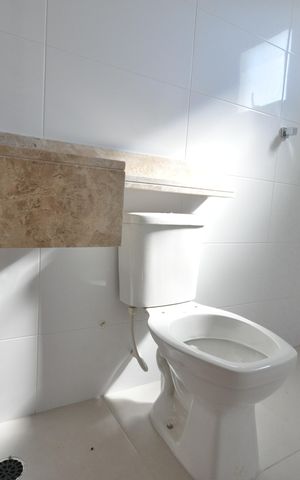 Casa à venda com 100m², 3 quartos e 1 vagaBanheiro do Quarto Suíte