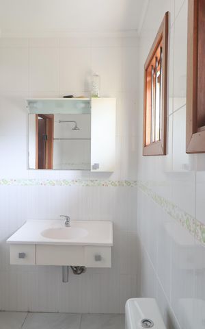 Casa à venda com 200m², 2 quartos e 2 vagasBanheiro da Suíte 2