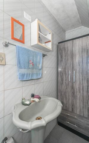 Casa à venda com 303m², 5 quartos e 2 vagasBanheiro 2 / Casa principal