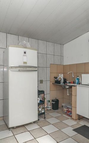 Casa à venda com 303m², 5 quartos e 2 vagasSala / Cozinha / Casa frente