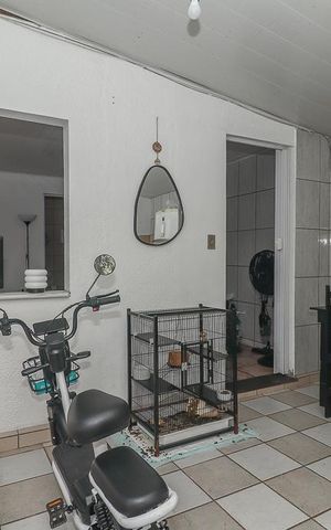 Casa à venda com 303m², 5 quartos e 2 vagasSala / Cozinha / Casa frente
