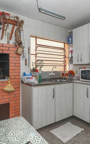Casa à venda com 303m², 5 quartos e 2 vagasCozinha / Casa principal