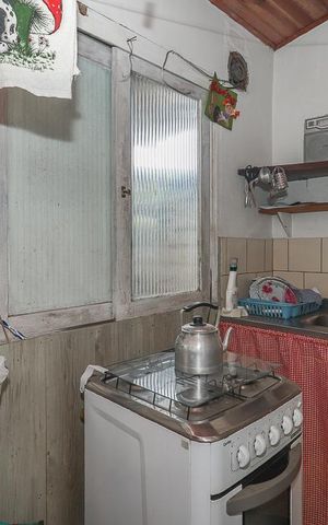 Casa à venda com 303m², 5 quartos e 2 vagasSala / Cozinha / Casa fundos