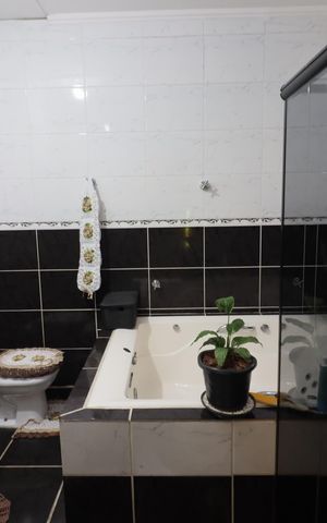 Casa à venda com 200m², 4 quartos e 1 vagaBanheiro da Suíte 1