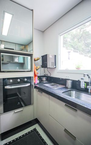 Casa de condomínio à venda com 165m², 3 quartos e 2 vagas Casa de condomínio à venda com 165m², 3 quartos e 2 vagasCozinha