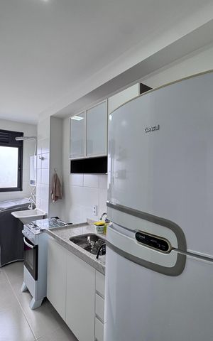Apartamento à venda com 50m², 2 quartos e 1 vaga Apartamento à venda com 50m², 2 quartos e 1 vagaCozinha e Área de Serviço