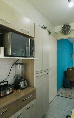 Apartamento à venda com 47m², 2 quartos e 1 vaga Apartamento à venda com 47m², 2 quartos e 1 vagaCozinha e Área de Serviço