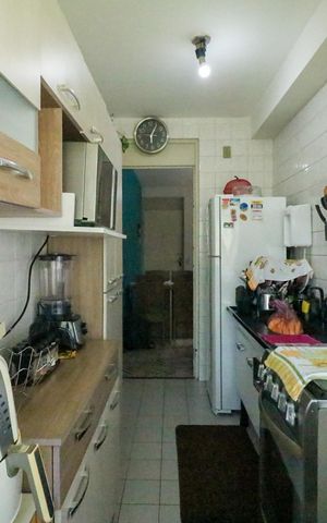 Apartamento à venda com 47m², 2 quartos e 1 vaga Apartamento à venda com 47m², 2 quartos e 1 vagaCozinha e Área de Serviço