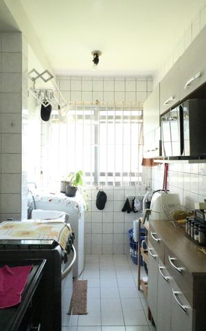 Apartamento à venda com 47m², 2 quartos e 1 vaga Apartamento à venda com 47m², 2 quartos e 1 vagaCozinha e Área de Serviço