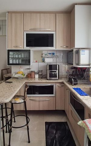 Apartamento à venda com 55m², 2 quartos e sem vaga Apartamento à venda com 55m², 2 quartos e sem vagaCozinha