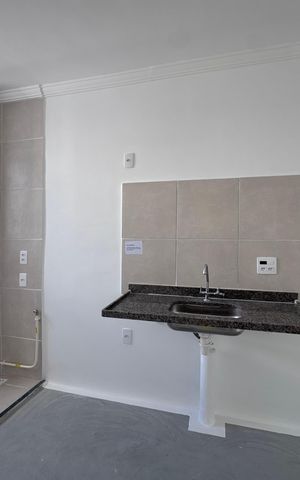 Apartamento à venda com 48m², 2 quartos e 1 vaga Apartamento à venda com 48m², 2 quartos e 1 vagaCozinha e Área de Serviço