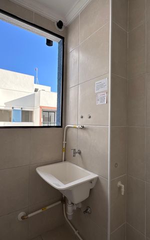 Apartamento à venda com 48m², 2 quartos e 1 vaga Apartamento à venda com 48m², 2 quartos e 1 vagaCozinha e Área de Serviço
