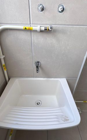 Apartamento à venda com 48m², 2 quartos e 1 vaga Apartamento à venda com 48m², 2 quartos e 1 vagaCozinha e Área de Serviço