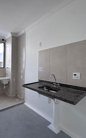 Apartamento à venda com 48m², 2 quartos e 1 vaga Apartamento à venda com 48m², 2 quartos e 1 vagaCozinha e Área de Serviço