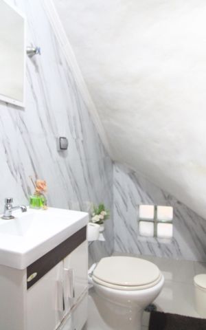 Casa à venda com 138m², 2 quartos e 2 vagasLavabo