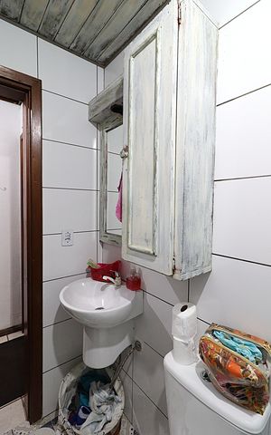 Casa de condomínio à venda com 86m², 2 quartos e 1 vagaBanheiro