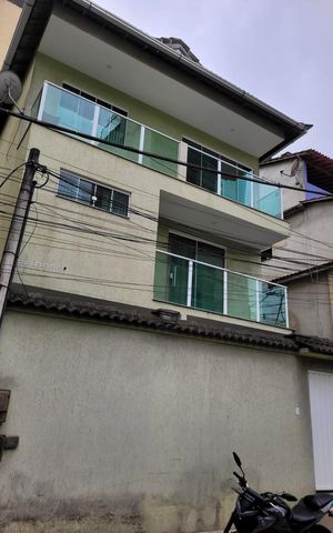 Casa à venda com 120m², 3 quartos e 2 vagas Casa à venda com 120m², 3 quartos e 2 vagasFachada